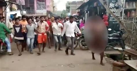 In the disturbing video the terrified teenagers are seen cowering naked in the street as adult men beat them until they bleed. . Girl stripped nude video